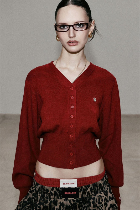 Chemisier cardigan en tricot rouge à col en V