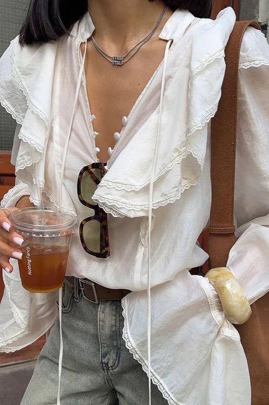 Bluse mit V-Ausschnitt und Spitzenbesatz