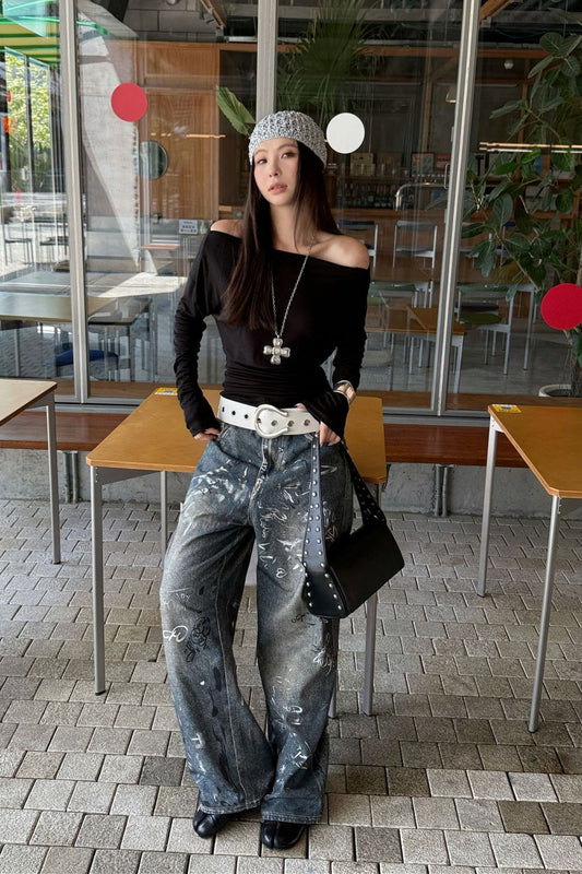 Jeans mit weitem Bein und Farbspritzer-Graffiti