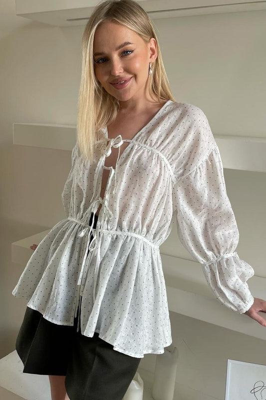 Haut court ample à manches longues et col en V