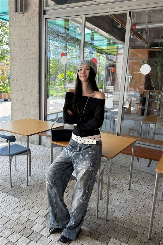 Jeans mit weitem Bein und Farbspritzer-Graffiti