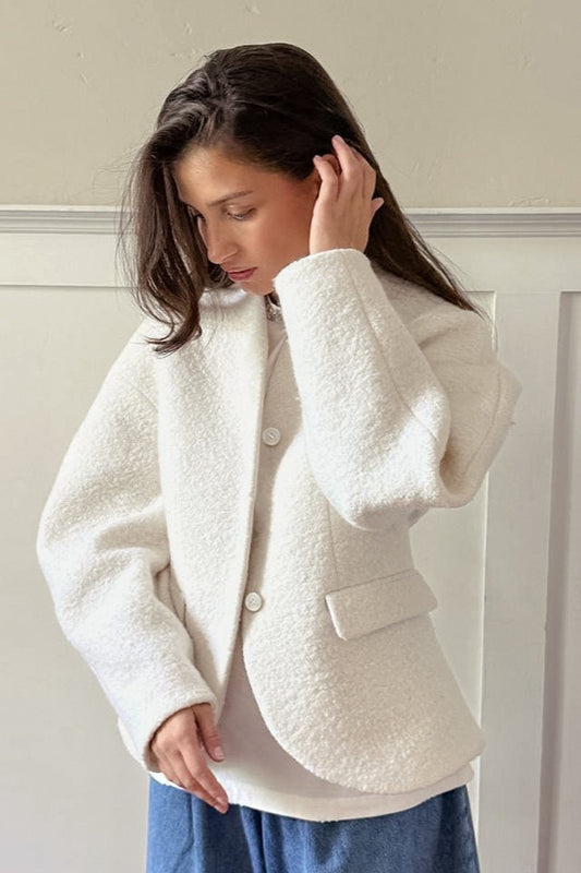 Veste en laine épaisse à col en V