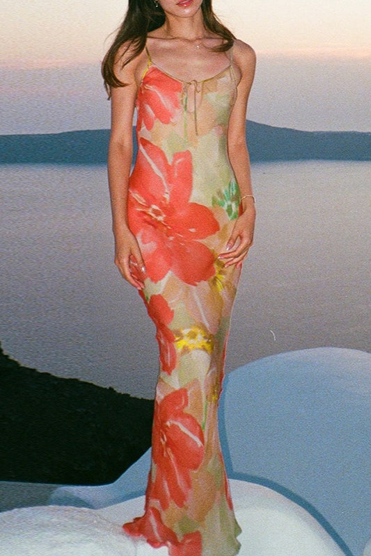 Robe longue sirène à bretelles et découpes florales