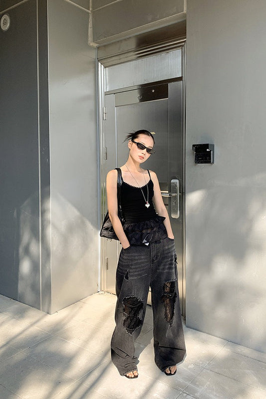 Zerrissene Jeans mit weitem Bein und Spitzeneinsatz