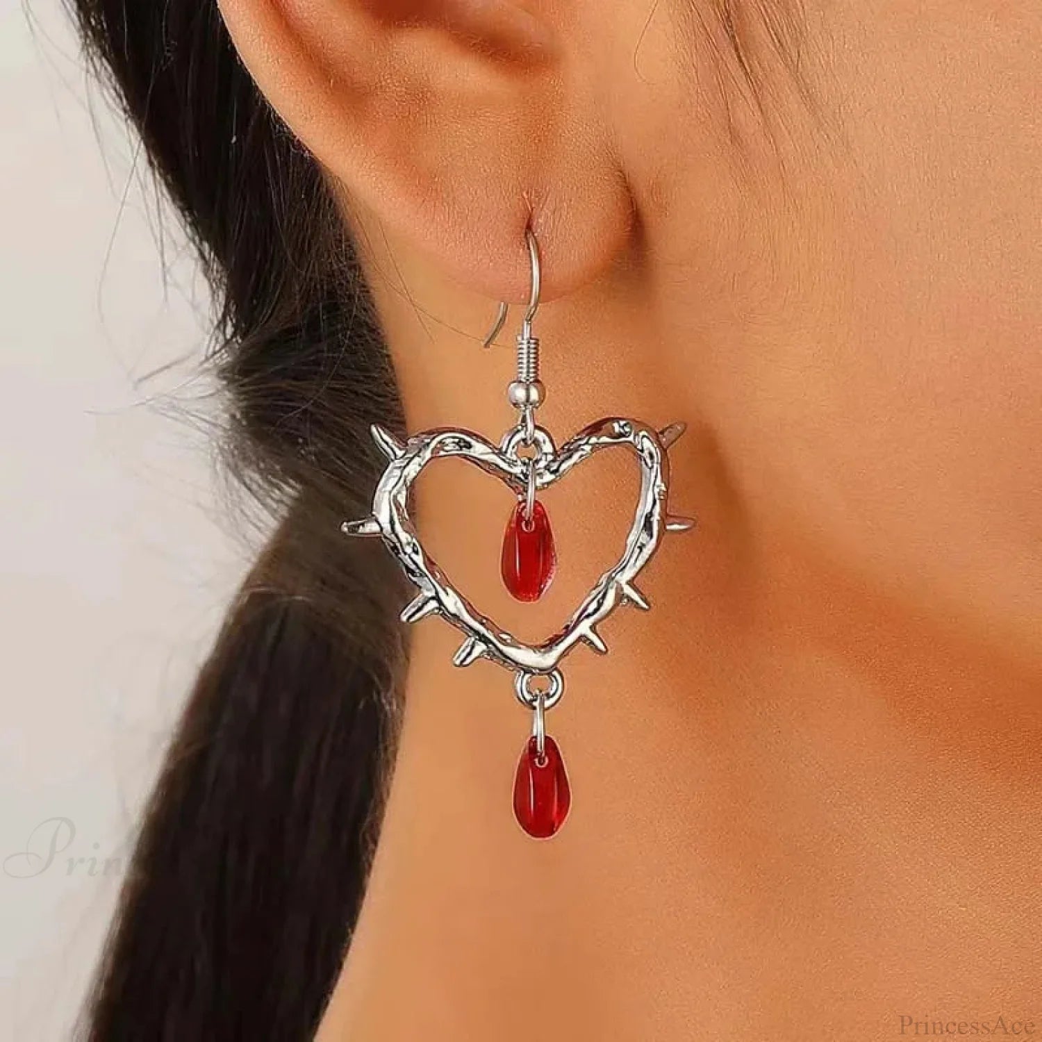 Dark Spiky Ebony Flow Oil Love Earring Red