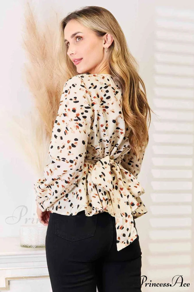 Peplum Plunge Patterned Tied Blouse