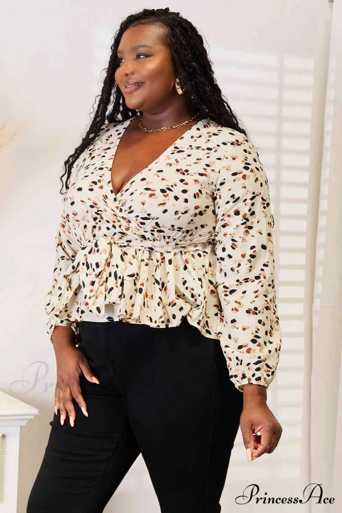 Peplum Plunge Patterned Tied Blouse
