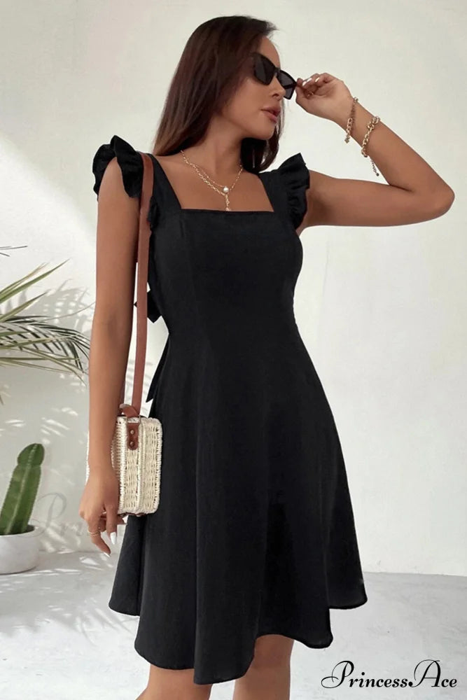 Sleeveless Mini Dress With Ruffle Detail And Tie-Back Black / Xs Dresses